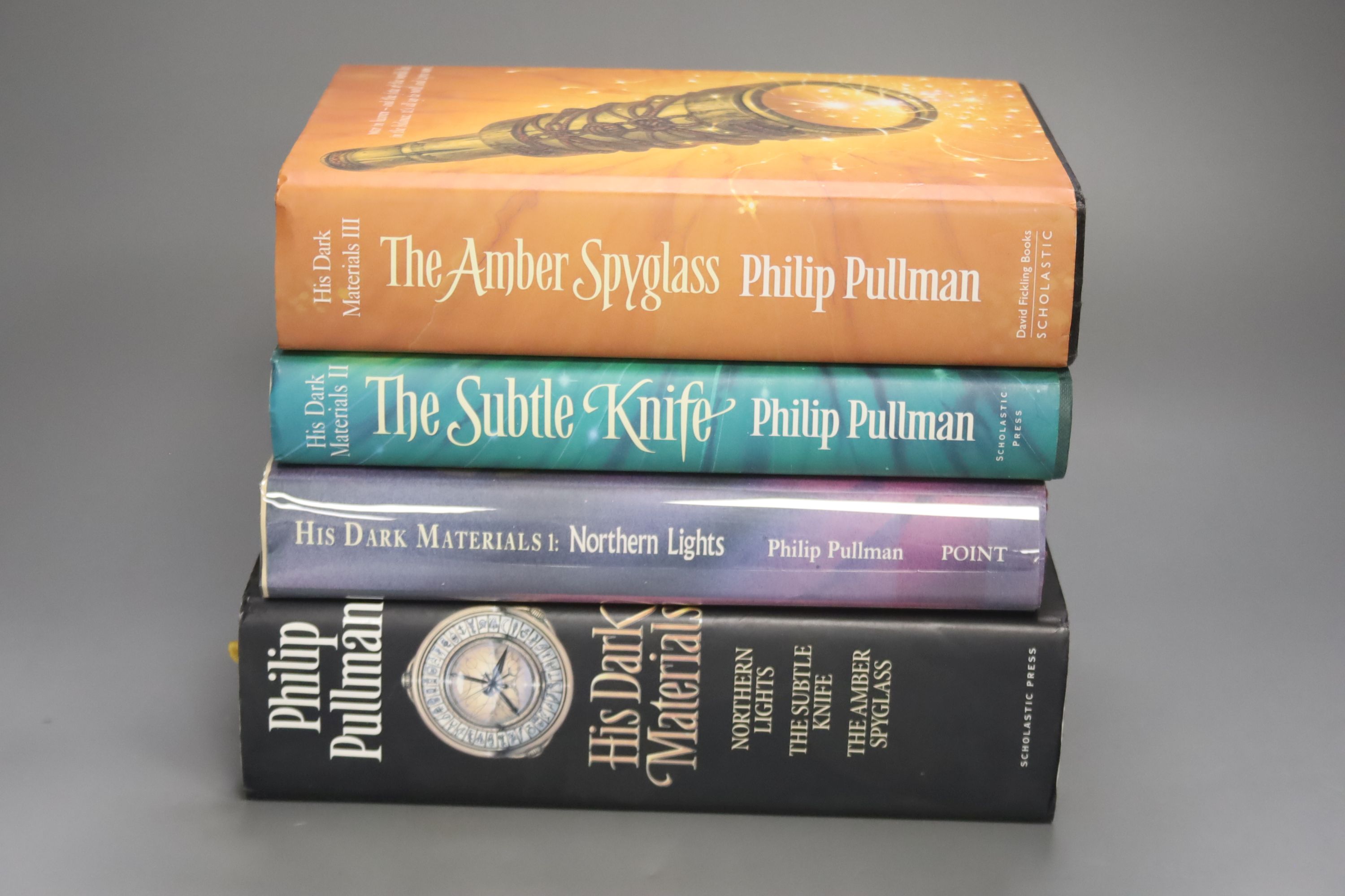 Pullman, Philip – His Dark Materials, the combined trilogy, 18vo, hardback, signed (dj present with signed letter of acknowledgement, some scuffing to dj, binding loose) Scholastic Press, 2001., Pullman, Philip – His Dar